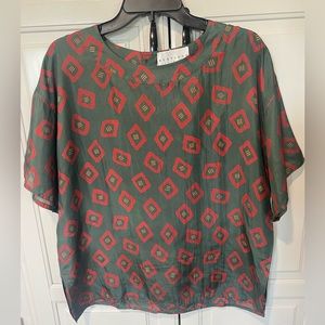 Vintage 100% silk tribal pint top. Size L
